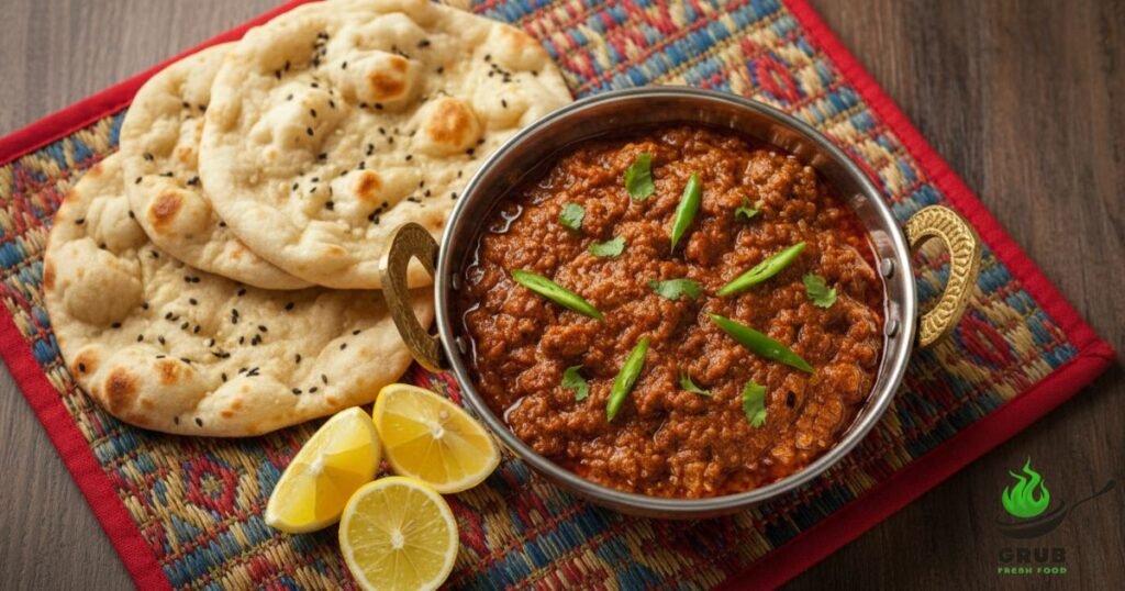 Goat Brain Masala served with naan and garnished with coriander